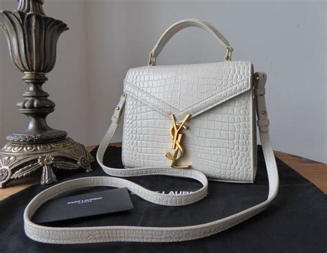 ysl white mini bag|ysl mini cassandra bag.